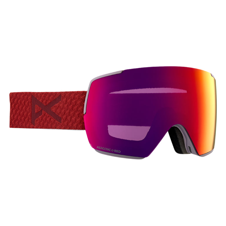 Ski goggles with red and purple lens on a white background